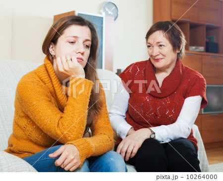 Mature mother and sad adult daughter 10264000