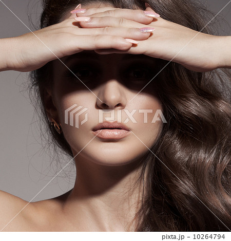 Fashion Portrait. Beautiful Brunette Girl. Curly Hair. 10264794