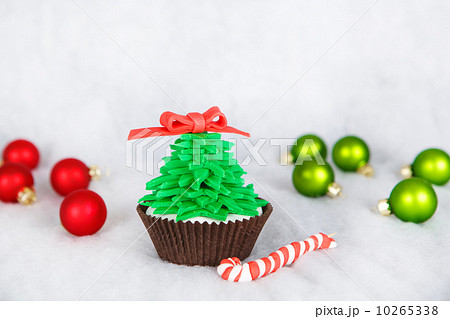 Christmas tree cupcake with white fondant frosting 10265338