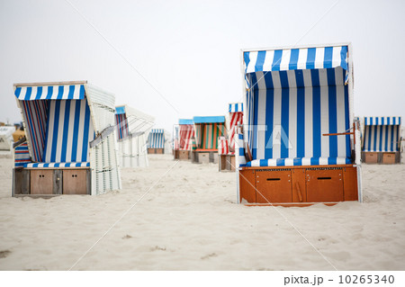 Colorful beach chairs with stripes at the beach of St.Peter Ordi 10265340