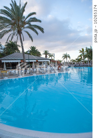 Beautiful hotel swimming pool befor sunrise Beautiful hotel swimming pool befor sunrise 10265374