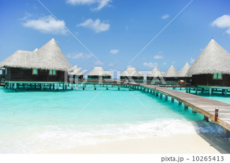 Water villas on tropical island on Maldives Water villas on tropical island on Maldives 10265413