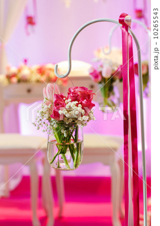 Beautiful flower arrangement in white and pink for wedding or ev 10265543