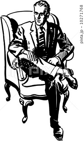 Man Sitting In Armchair 10271768
