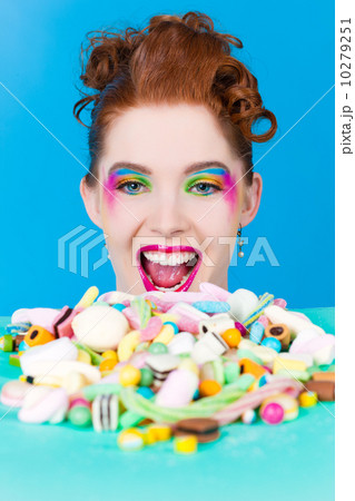 Girl with sweet goodies and candy Girl with sweet goodies and candy 10279251