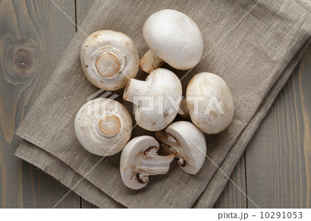 fresh white champignon on wood table fresh white champignon on wood table 10291053