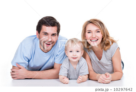 Smiling young family with little child. Smiling young family with little child. 10297642