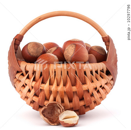 Hazelnuts in wicker basket Hazelnuts in wicker basket 10297796
