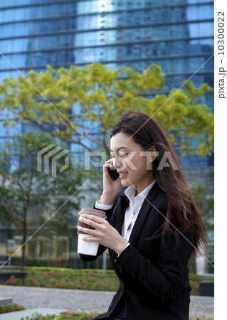 Asian business woman taking a break Asian business woman taking a break 10300022