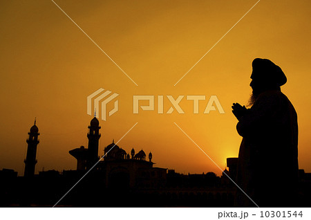 Silhouette of Sikh prayer Silhouette of Sikh prayer 10301544