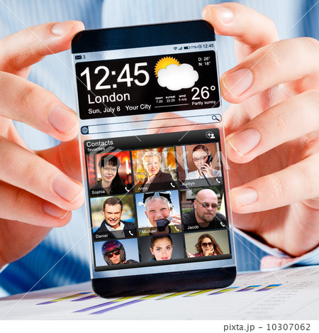 Smartphone with transparent screen in human hands. 10307062