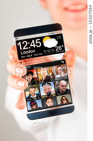 Smartphone with transparent screen in human hands. Smartphone with transparent screen in human hands. 10307064