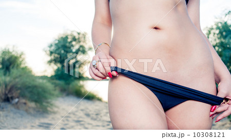 Pretty belly and black panties undresing outdoors 10308121