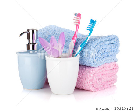 Toothbrush, soap, two towels and flower Toothbrush, soap, two towels and flower 10315321