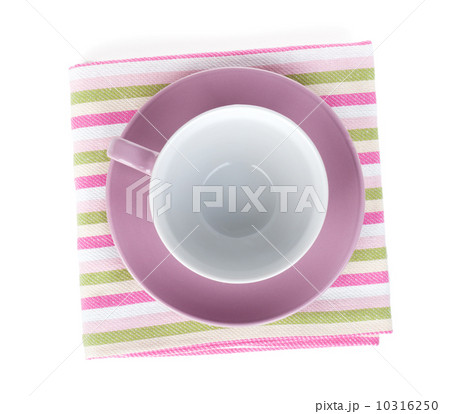 Coffee cup over kitchen towel Coffee cup over kitchen towel 10316250