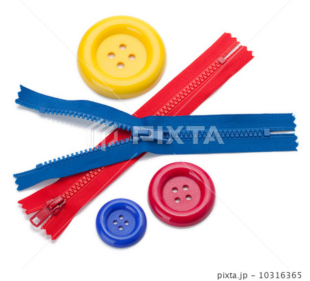 Three colored sewing buttons and two zippers Three colored sewing buttons and two zippers 10316365