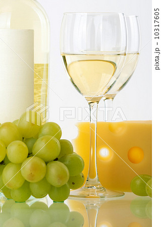Bottle of white wine, wine glasses, grape and cheese 10317605