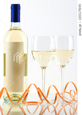 Bottle of white wine and wine glasses 10317645