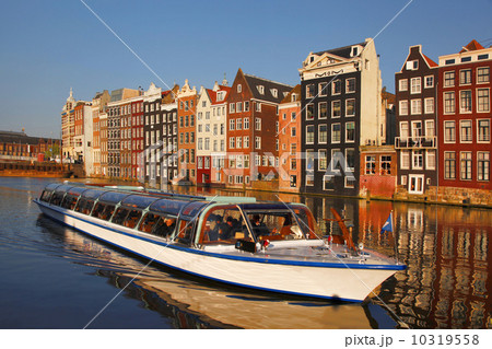 Amsterdam city with boats on canal in Holland 10319558