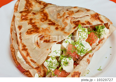 pancakes with cheese and vegetables 10320727