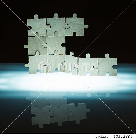 Wooden puzzle and backlight background. Close up 10322839