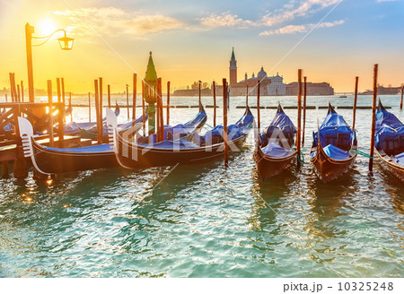 Venetian gondolas at sunrise Venetian gondolas at sunrise 10325248