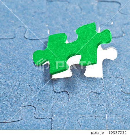 setting the last green piece of puzzle setting the last green piece of puzzle 10327232