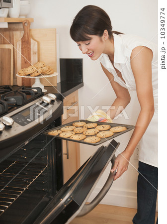 Woman baking Woman baking 10349774