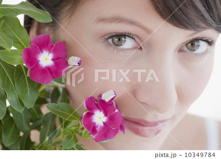 Woman looking into camera Woman looking into camera 10349784