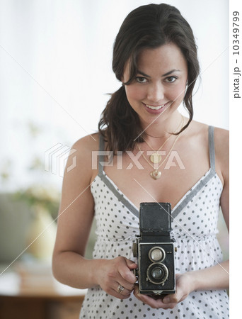 A woman with a camera 10349799