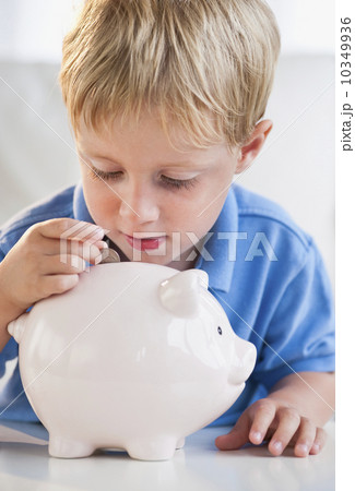 Child with piggybank Child with piggybank 10349936
