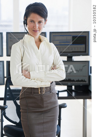 Female trader looking at camera Female trader looking at camera 10350582