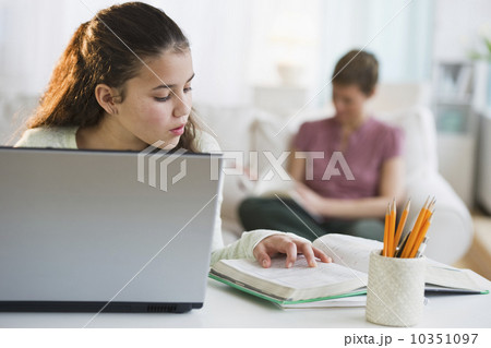 Young girl doing homework 10351097