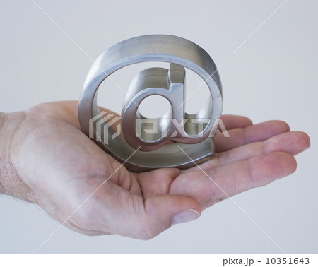 Hand holding at symbol Hand holding at symbol 10351643