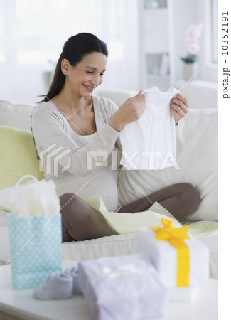 Pregnant woman at baby shower Pregnant woman at baby shower 10352191