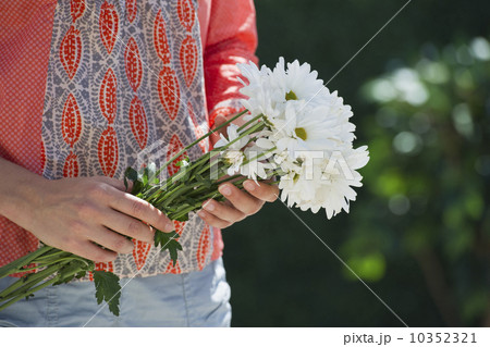 Fresh flowers in woman's hands 10352321