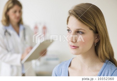 Doctor and patient exam room 10352360
