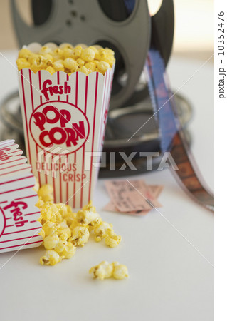 Popcorn and movie reel 10352476