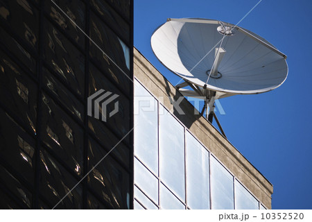 Satellite dish on top of building 10352520