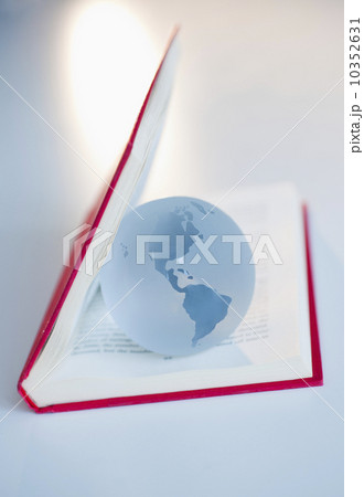 Globe inside a book 10352631