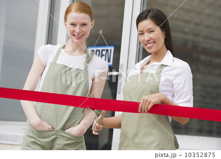 Cutting red ribbon at opening ceremony 10352875