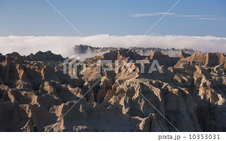USA, South Dakota, Mountains in morning fog in Badlands National Park 10353031