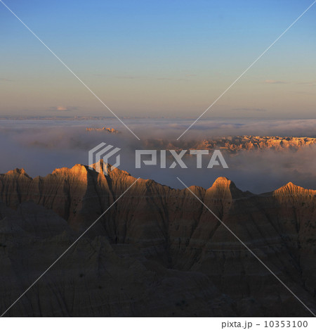 USA, South Dakota, Mountains in morning fog in Badlands National Park USA, South Dakota, Mountains in morning fog in Badlands National Park 10353100