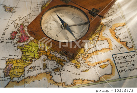 Antique compass on map 10353272