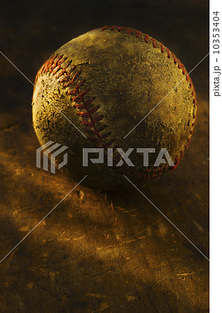 Antique baseball on wooden floor 10353404