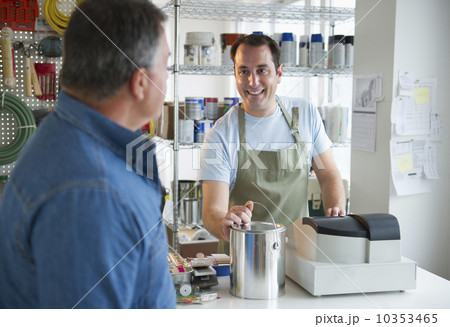 USA, New Jersey, Jersey City, Shop owner and assistant working in paint shop USA, New Jersey, Jersey City, Shop owner and assistant working in paint shop 10353465