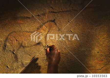 Studio shot of hand making cave painting of horse 10353563