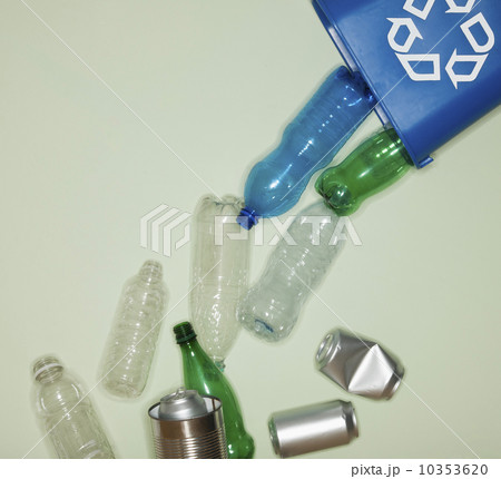 Bottles and cans falling from recycle container 10353620