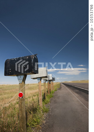 USA, South Dakota, Row of rural mailboxes on roadside 10353766