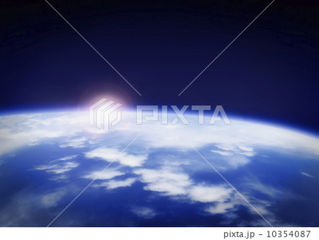 Space with rising sun above planet earth 10354087